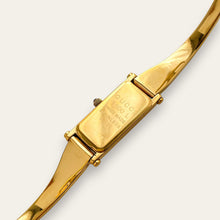 Load image into Gallery viewer, Vintage Gucci 1500L Gold Bangle Watch with Mother of Pearl Dial, 90s Quartz