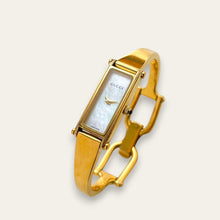 Load image into Gallery viewer, Vintage Gucci 1500L Gold Bangle Watch with Mother of Pearl Dial, 90s Quartz