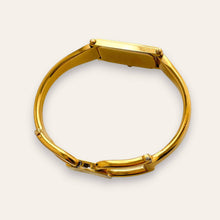 Load image into Gallery viewer, Vintage Gucci 1500L Gold Bangle Watch with Mother of Pearl Dial, 90s Quartz