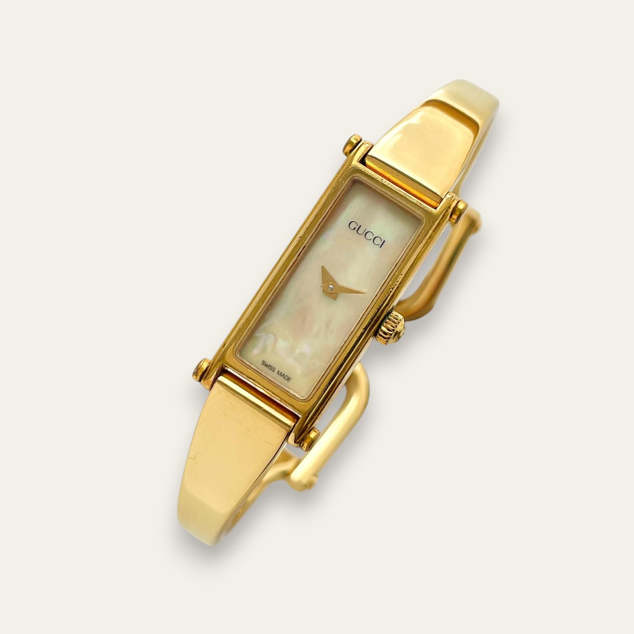 Vintage Gucci 1500 Gold Bangle Watch with Mother of Pearl Dial