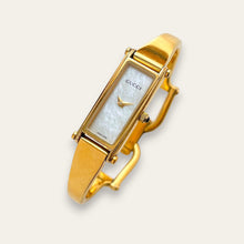 Load image into Gallery viewer, Vintage Gucci 1500L Gold Bangle Watch with Mother of Pearl Dial, 90s Quartz
