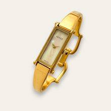 Load image into Gallery viewer, Vintage Gucci 1500L Gold Bangle Watch with Mother of Pearl Dial, 90s Quartz