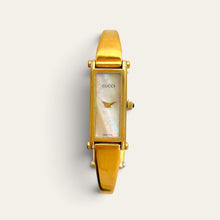 Load image into Gallery viewer, Vintage Gucci 1500 Gold Bangle Watch with Mother of Pearl Dial, 90s Quartz