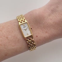 Load and play video in Gallery viewer, Thin Vintage 1990s Gold-Plated Ladies' Seiko Quartz Watch with Mother of Pearl Dial