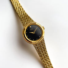 Load image into Gallery viewer, 1990s Ladies' Gold-Tone Seiko Quartz Watch with Black Round Dial