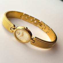 Load image into Gallery viewer, Vintage 1990s Gold-Plated Ladies' Seiko Quartz Watch With Semi Bangle Bracelet