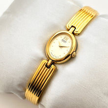 Load image into Gallery viewer, Vintage 1990s Gold-Plated Ladies' Seiko Quartz Watch With Semi Bangle Bracelet