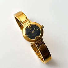 Load image into Gallery viewer, Vintage Gold-Plated Ladies' Givenchy Bangle Watch with Black Dial and Quartz Movement