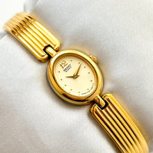 Load image into Gallery viewer, Vintage 1990s Gold-Plated Ladies' Seiko Quartz Watch With Semi Bangle Bracelet