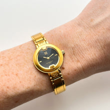 Load image into Gallery viewer, Vintage Gold-Plated Ladies' Givenchy Bangle Watch with Black Dial and Quartz Movement