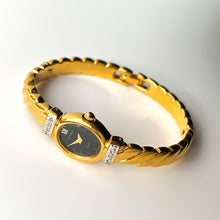 Load image into Gallery viewer, Rare 1990s Gold-Plated Lassale (Seiko) Articulated Bangle Quartz Watch with Black Dial and Diamond-Set Bezel