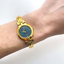 Load image into Gallery viewer, Vintage 1990s Gold-Plated Ladies&#39; Givenchy &#39;Millesime&#39; Bangle Watch with Blue Dial and Quartz Movement
