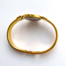 Load image into Gallery viewer, Vintage 1990s Gold-Plated Ladies&#39; Givenchy &#39;Millesime&#39; Bangle Watch with Blue Dial and Quartz Movement
