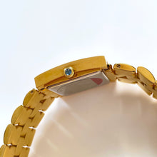 Load image into Gallery viewer, Vintage 1990s Unisex Gold-Plated Givenchy ‚ÄòApsaras‚Äô Quartz Watch with Beige Dial
