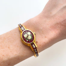 Load image into Gallery viewer, Vintage Andr√© Mouche Quartz Watch with Burgundy Enamel Floral Design, Concealead Dial and Gold-Plated Bangle Bracelet
