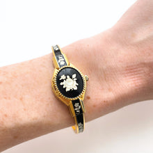 Load image into Gallery viewer, Vintage André Mouche Quartz Watch - Black Floral Design, Concealed Dial, Gold-Plated
