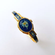 Load image into Gallery viewer, Vintage Andr√© Mouche Quartz Watch with Green and Navy Enamel Floral Design, Concealed Dial and Gold-Plated Bangle Bracelet - Boxed
