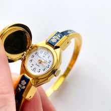 Load image into Gallery viewer, Vintage André Mouche Quartz Watch with Navy Enamel Floral Design, Concealead Dial and Gold-Plated Bangle Bracelet
