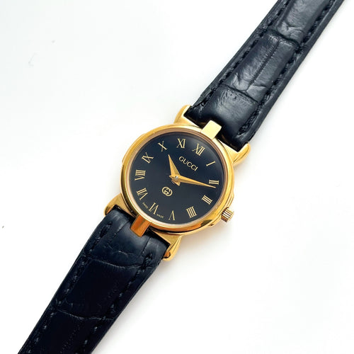 90s Gold-Plated Ladies' Gucci Quartz Watch with Black Leather Strap - Boxed