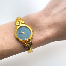 Load image into Gallery viewer, Vintage 1990s Gold-Plated Ladies&#39; Givenchy &#39;Millesime&#39; Bangle Watch with Blue Dial and Quartz Movement
