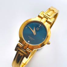 Load image into Gallery viewer, Vintage 1990s Gold-Plated Ladies&#39; Givenchy &#39;Millesime&#39; Bangle Watch with Blue Dial and Quartz Movement
