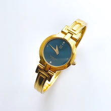 Load image into Gallery viewer, Vintage 1990s Gold-Plated Ladies&#39; Givenchy &#39;Millesime&#39; Bangle Watch with Blue Dial and Quartz Movement

