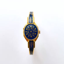 Load image into Gallery viewer, Vintage Andr√© Mouche Quartz Watch with Gold and Navy Enamel Floral Design, Concealead Dial and Gold-Plated Bangle Bracelet
