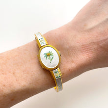 Load image into Gallery viewer, Vintage Andr√© Mouche Quartz Watch with Enamel Floral Design, Concealead Dial and Gold-Plated Bangle Bracelet
