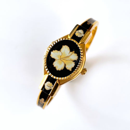 Vintage Andr√© Mouche Quartz Watch with Black Enamel Floral Design, Concealead Dial and Gold-Plated Bangle Bracelet