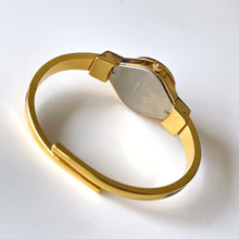 Load image into Gallery viewer, Vintage Andr√© Mouche Quartz Watch with Black and Green Enamel Floral Design, Concealead Dial and Gold-Plated Bangle Bracelet
