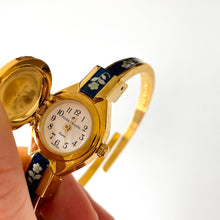 Load image into Gallery viewer, Vintage Andr√© Mouche Quartz Watch with Black and Green Enamel Floral Design, Concealead Dial and Gold-Plated Bangle Bracelet

