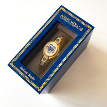 Load image into Gallery viewer, Vintage Andr√© Mouche Quartz Watch with Beige and Blue Enamel Floral Design, Concealead Dial and Gold-Plated Bangle Bracelet
