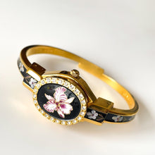 Load image into Gallery viewer, Vintage Andr√© Mouche Quartz Watch with Black and Purple Enamel Floral Design, Concealead Dial and Gold-Plated Bangle Bracelet
