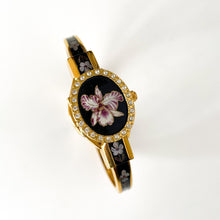 Load image into Gallery viewer, Vintage Andr√© Mouche Quartz Watch with Black and Purple Enamel Floral Design, Concealead Dial and Gold-Plated Bangle Bracelet
