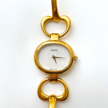 Load image into Gallery viewer, 1990s Gucci Quartz Watch with Mother of Pearl Dial and Semi Bangle Bracelet
