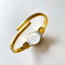 Load image into Gallery viewer, Vintage Andr√© Mouche Quartz Watch with Green and Navy Enamel Floral Design, Concealed Dial and Gold-Plated Bangle Bracelet - Boxed
