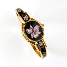 Load image into Gallery viewer, Vintage André Mouche Quartz Watch with Black and Purple Enamel Floral Design, Concealead Dial and Gold-Plated Bangle Bracelet
