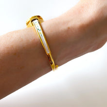 Load image into Gallery viewer, Vintage Andr√© Mouche Quartz Watch with Enamel Floral Design, Concealead Dial and Gold-Plated Bangle Bracelet
