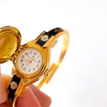 Load image into Gallery viewer, Vintage Andr√© Mouche Quartz Watch with Black Enamel Floral Design, Concealead Dial and Gold-Plated Bangle Bracelet
