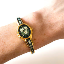 Load image into Gallery viewer, Vintage Andr√© Mouche Quartz Watch with Black and Green Enamel Floral Design, Concealead Dial and Gold-Plated Bangle Bracelet
