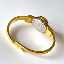 Load image into Gallery viewer, Vintage Andr√© Mouche Quartz Watch with Pink Enamel Floral Design, Concealead Dial and Gold-Plated Bangle Bracelet
