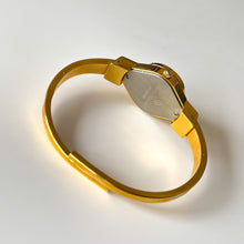 Load image into Gallery viewer, Vintage Andr√© Mouche Quartz Watch with Beige and Blue Enamel Floral Design, Concealead Dial and Gold-Plated Bangle Bracelet
