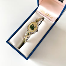 Load image into Gallery viewer, Vintage Andr√© Mouche Quartz Watch with Pink Enamel Floral Design, Concealead Dial and Silver Tone Bangle Bracelet

