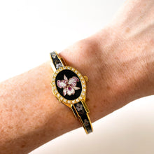 Load image into Gallery viewer, Vintage Andr√© Mouche Quartz Watch with Black and Purple Enamel Floral Design, Concealead Dial and Gold-Plated Bangle Bracelet
