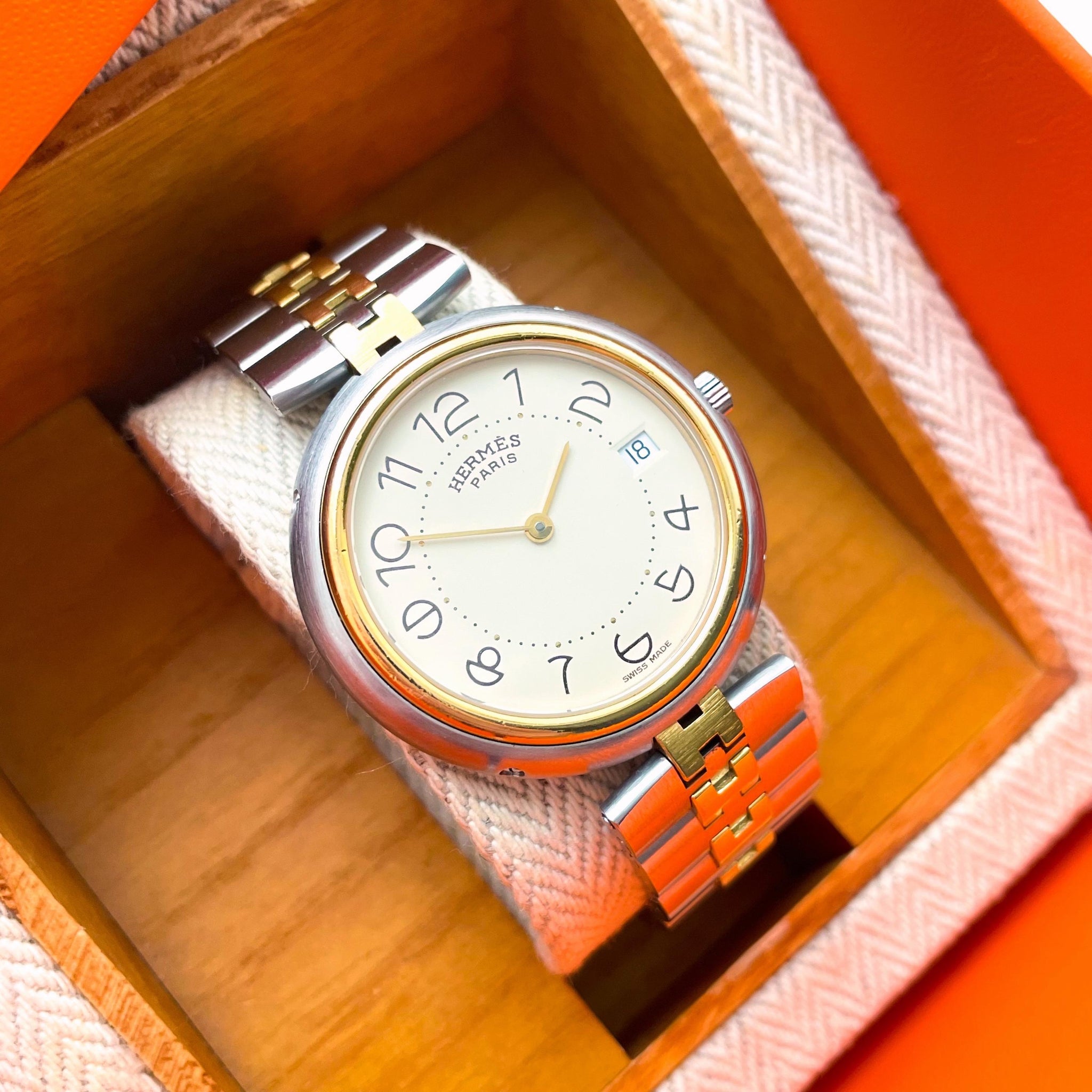 Authentic Hermès orange Leather Strap Gold and silver Tone Round Dial Watch Popular Hermes watch with a yellow strap, a striking piece  main image 2
