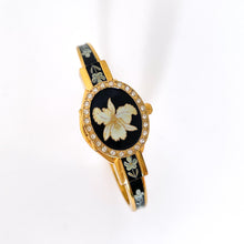 Load image into Gallery viewer, Vintage Andr√© Mouche Quartz Watch with Black Enamel Floral Design, Concealead Dial and Gold-Plated Bangle Bracelet
