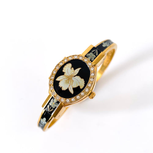 Vintage Andr√© Mouche Quartz Watch with Black Enamel Floral Design, Concealead Dial and Gold-Plated Bangle Bracelet
