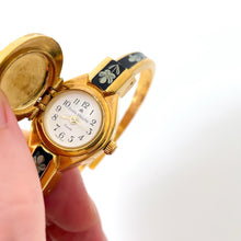 Load image into Gallery viewer, Vintage Andr√© Mouche Quartz Watch with Black Enamel Floral Design, Concealead Dial and Gold-Plated Bangle Bracelet
