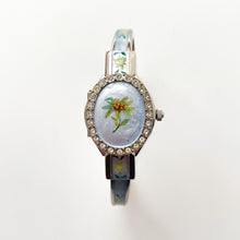 Load image into Gallery viewer, Vintage Andr√© Mouche Quartz Watch with Light Blue Enamel Floral Design, Concealed Dial and Silver-Tone Bangle Bracelet
