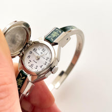 Load image into Gallery viewer, Vintage Andr√© Mouche Quartz Watch with Green Enamel Floral Design, Concealead Dial and Silver-Tone Bangle Bracelet
